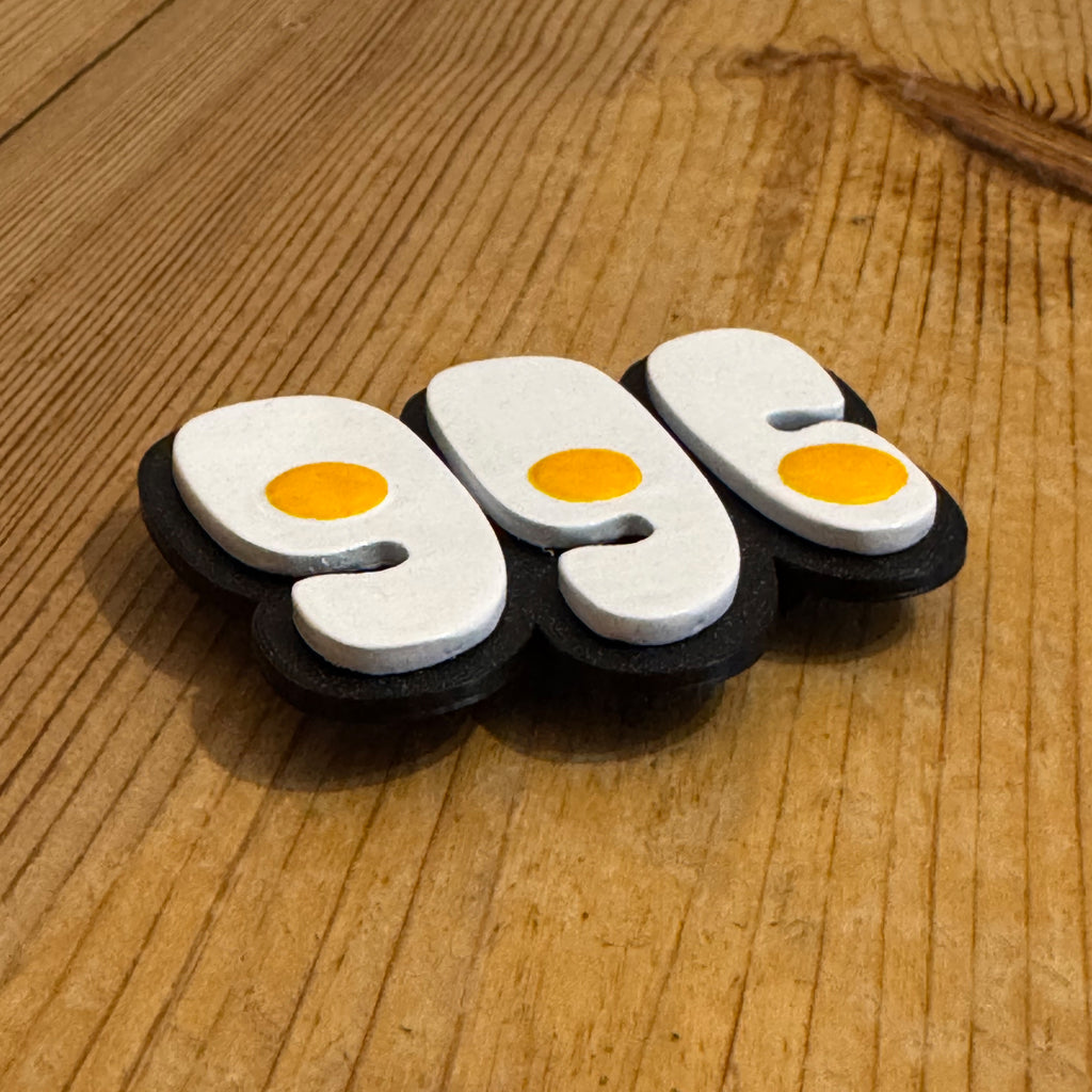 996 Fried Egg Grill Badge